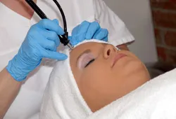 patient undergoing laser treatment to remove hair